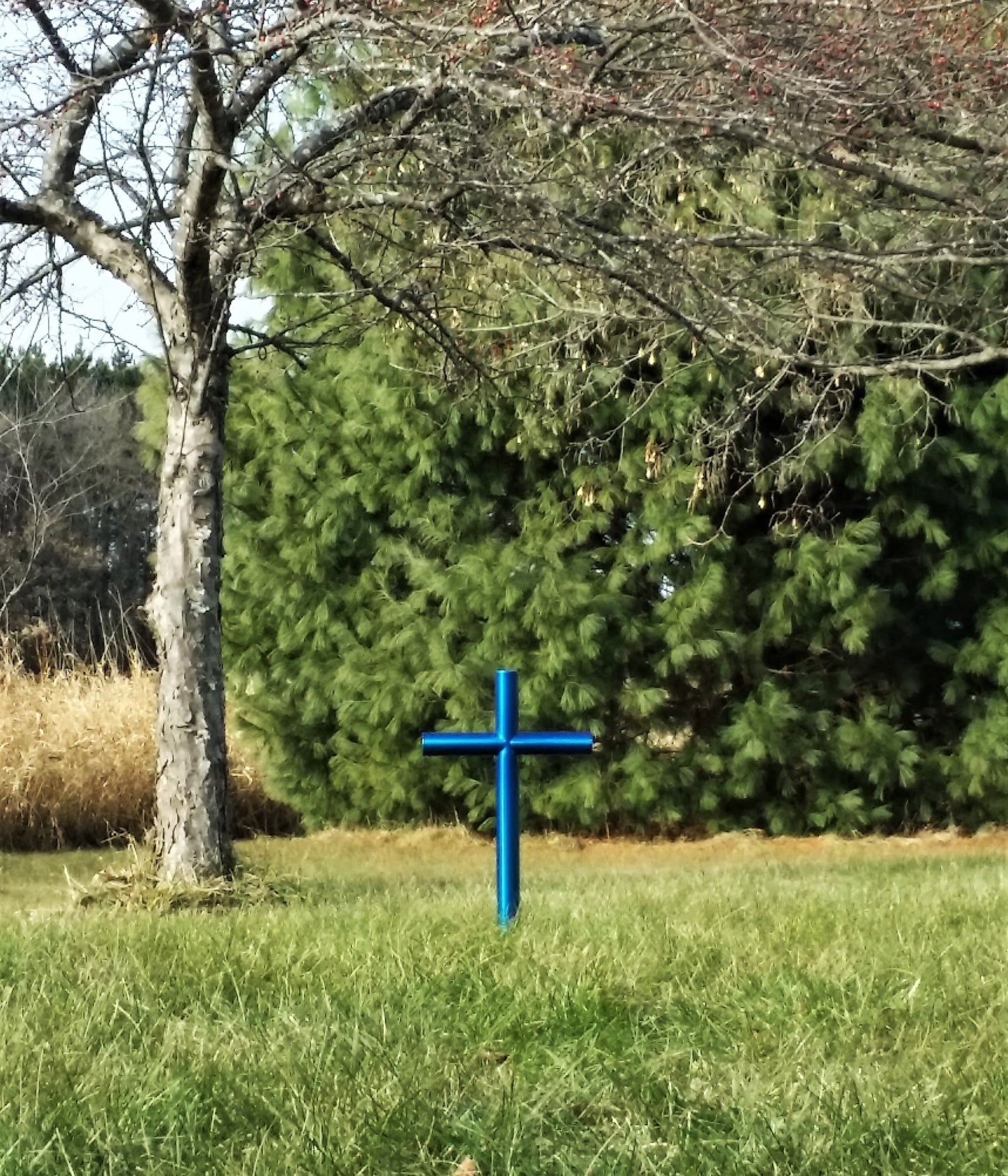 Everlasting Cross memorial is finished in our vibrant Blue, reflecting the beauty of the sky on a sunny day. The sorrow we feel with the loss of our loved one and the happiest of memories we hold so dear. Remembering them forever in the symbolism of the Everlasting Cross. The Blue baked powder coat over stainless steel will remain timeless as does the love and memories you hold forever. Esophageal or Stomach Cancer Ribbon, Prostate Cancer, Cervical Cancer Ribbon 