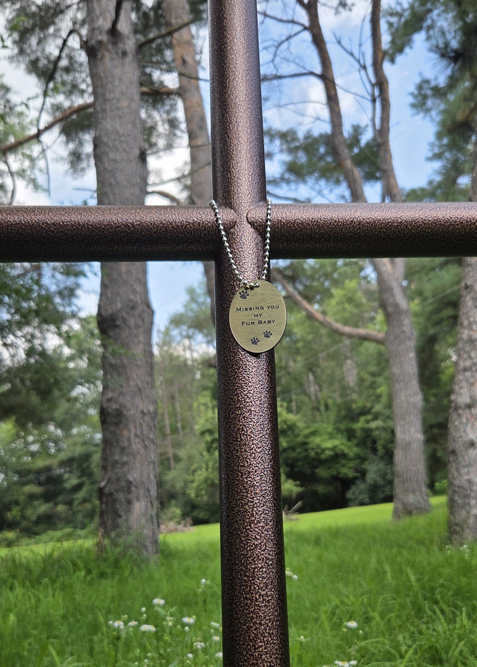 Three paw prints engraved on Gold EC Angle Charm and silver chain remembering that special moment.