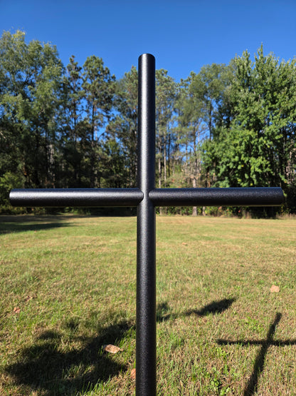 Black Ebony EC memorial cross shown in a close view to display this textured classic finish, as the sunlight dances and honors their memory. 