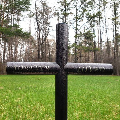 Everlasting Cross Memorial is a Tribute to Their Memory.  This close view of the engraved Forever Loved in a Lucida Calligraphy font. Is an example of one of the many ways to personalize and celebrate their life.