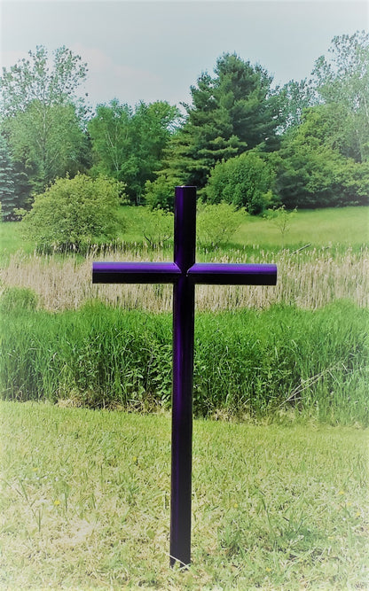Everlasting Cross finished in a brilliant Purple, standing tall and timeless on the hillside.  As it Tributes  the loved one passed, it celebrates their life and helps us heal. As we remember them, it makes them unforgettable.