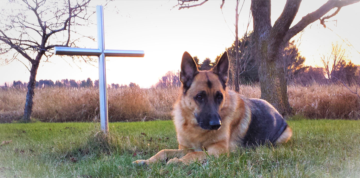 The first Everlasting Cross Memorial is resting in the favorite spot in the yard of the owners German Shepherd.  Their 2nd fur baby is sending his love to his older brother.  Large size measuring 21 inches wide by 41 inches tall and stainless steel end caps.  It Can Be A Cremation Urn for Dog, Cat, Reptile or Bird. They Become Our Family and The Loss Of Them Is heartfelt and they  are unforgettable and forever remembered. 