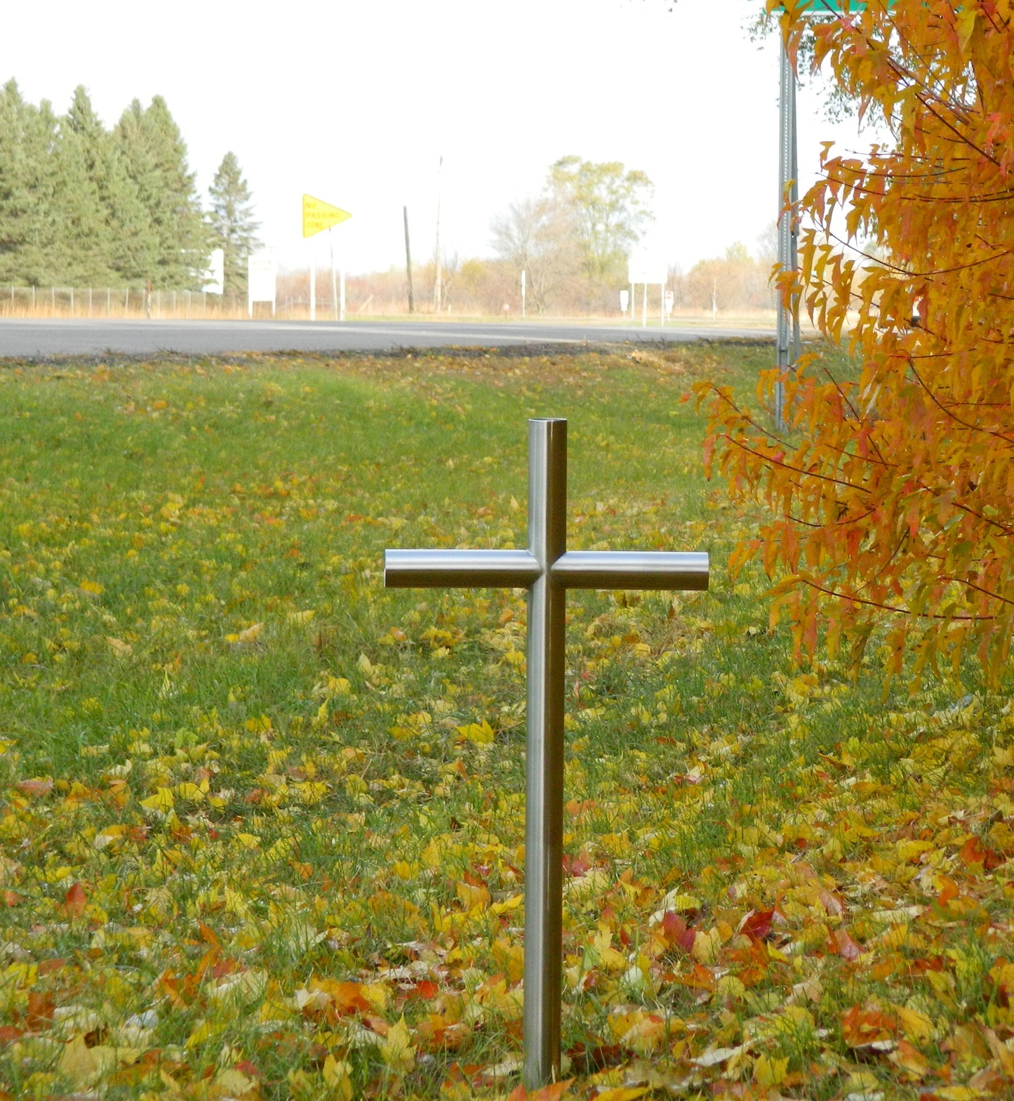 Satin Stainless finish is shown on this Roadside Everlasting Cross Memorial.  Manufactured of 304 Stainless Steel Will Be Forever Lasting Like Your Memories and Love of Your Loved One Loss. Personalized Engraving creates another Unique option to Remember Them.